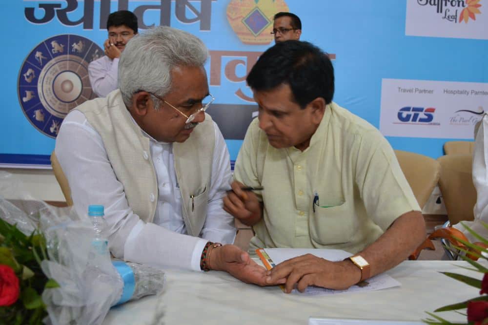 Urban Development Minister Madan Kaushik has shown his hand to astrologer