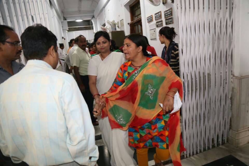 woman reavhes to assembly speaker during session
