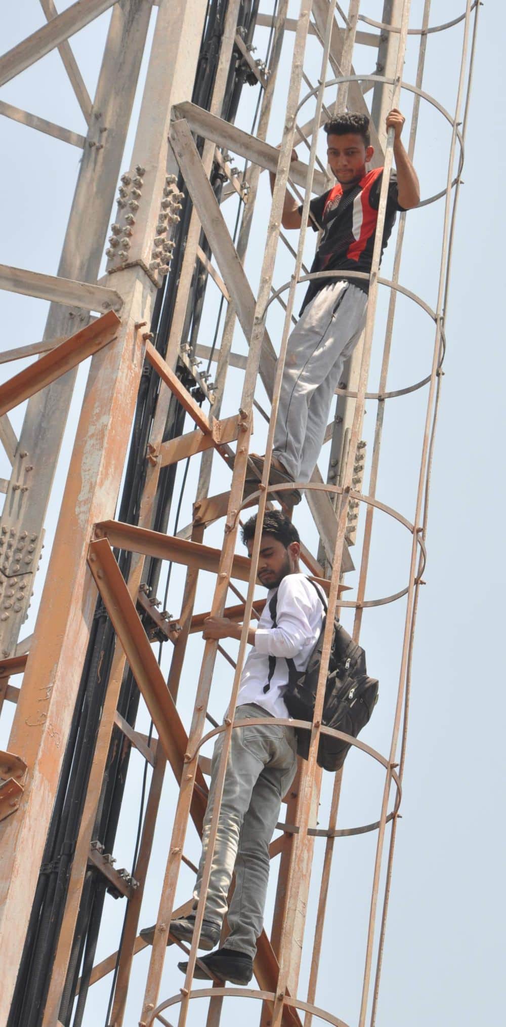 photos of Dav student on mobile tower