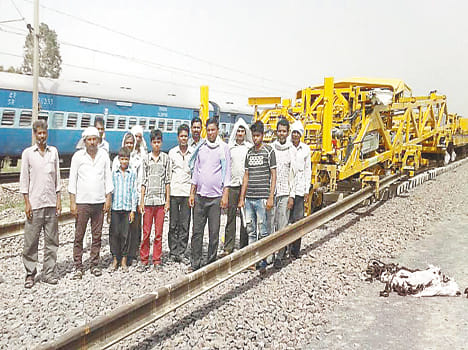Farmers work on the freight corridor