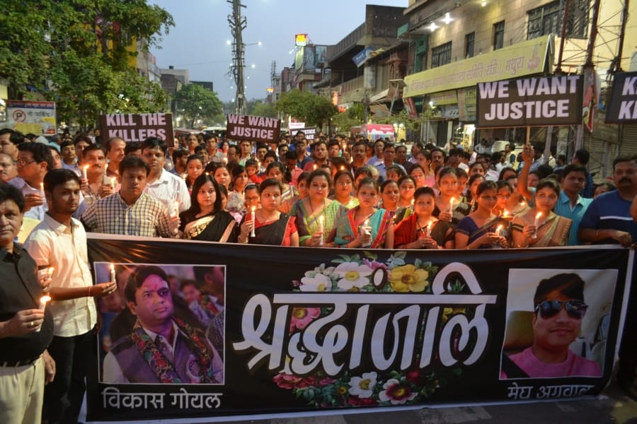 candle march in mathura for justice in jwellers murder case