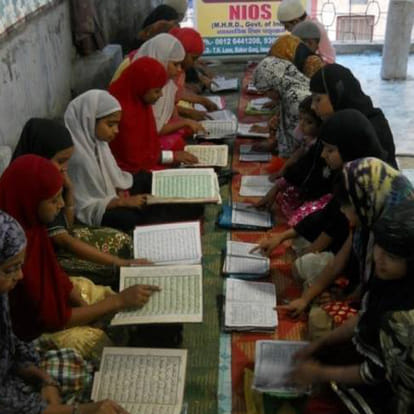 a hindu girl got top 10 rank in madarsah exams