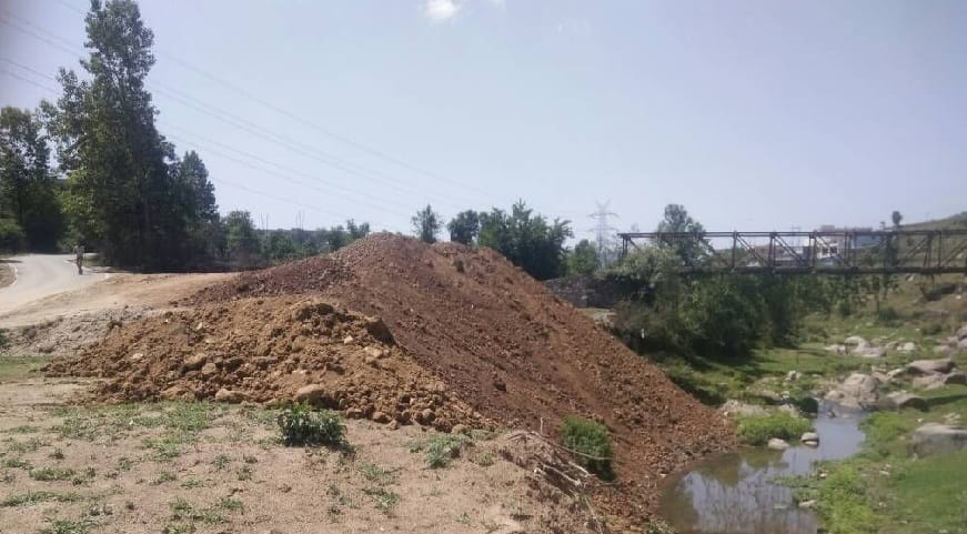 Ganga is being poured into the river, the clay pile