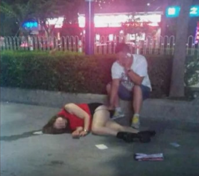 intoxicated woman taken advantage on the roadside by the stranger