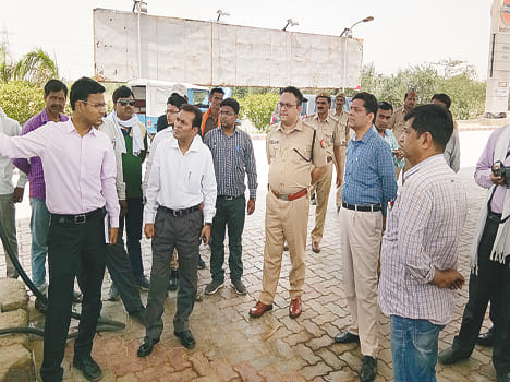 DM and SP protest strike on petrol pump