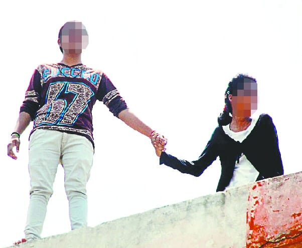 Schoolgirls on the roof, trying to give life in mujaffarnagar