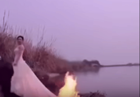 bride sets her gown on fire for perfect selfie 
