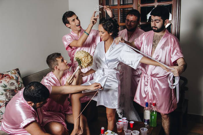 A Computer Engineering Bride is dressed up with her male friends