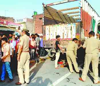 Bike busted in truck, three die