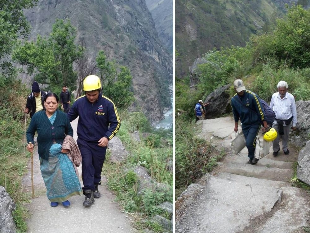 pilgrims are walking by foot after block badrinath highway
