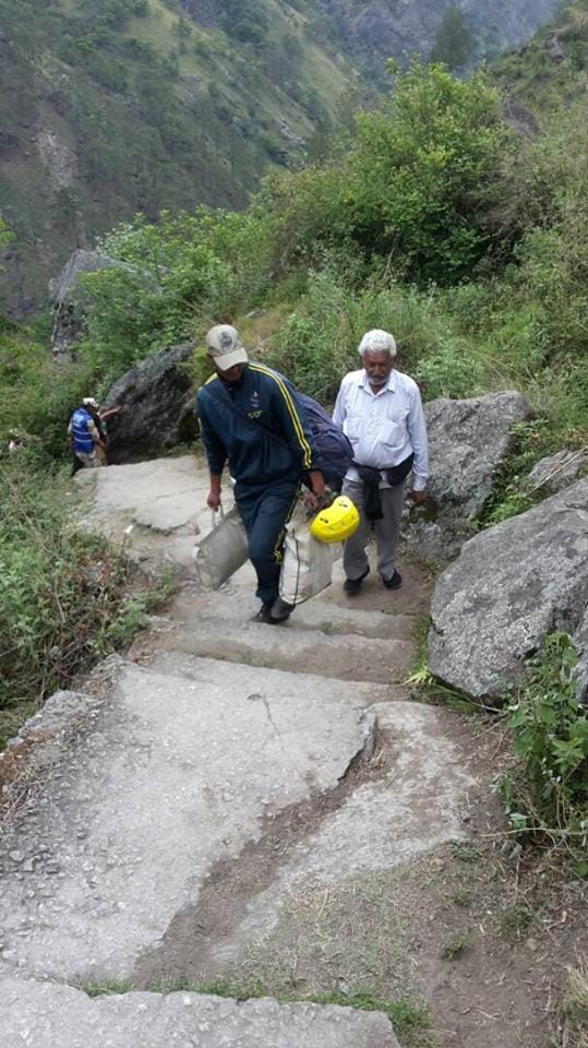 pilgrims are walking by foot after block badrinath highway