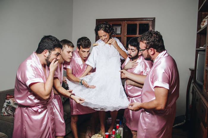 A Computer Engineering Bride is dressed up with her male friends