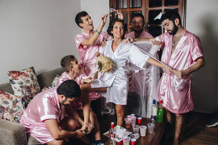 A Computer Engineering Bride is dressed up with her male friends