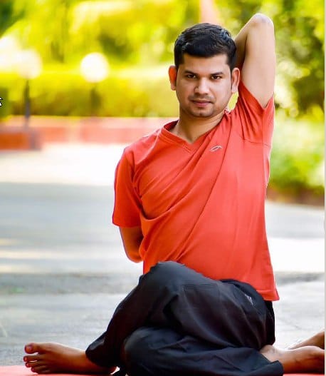 By teaching people yoga Make young career: Mangesh