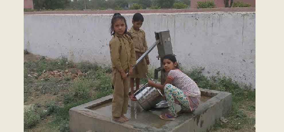 School in greater noida student has to clean utensil after having mid day meal