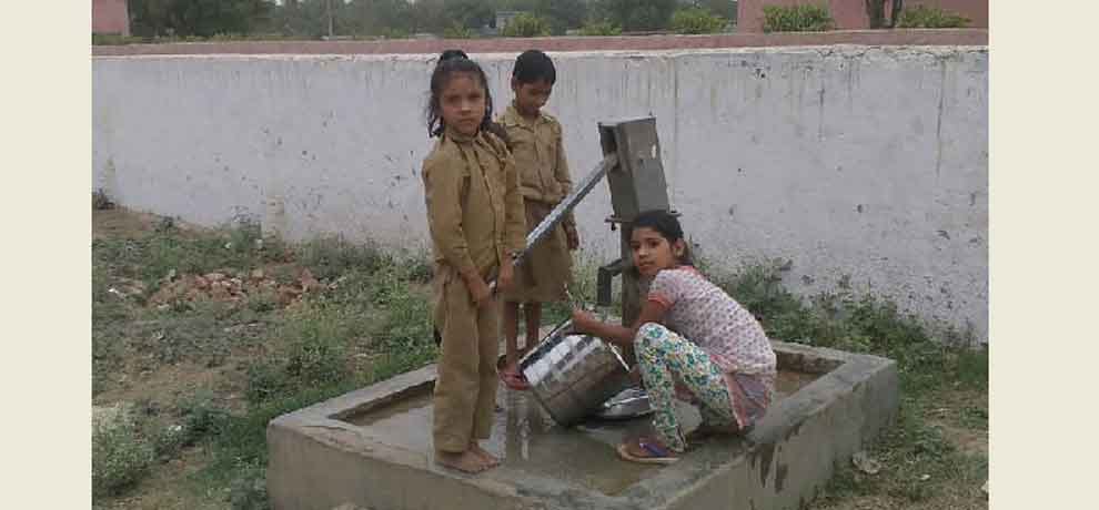 School in greater noida student has to clean utensil after having mid day meal