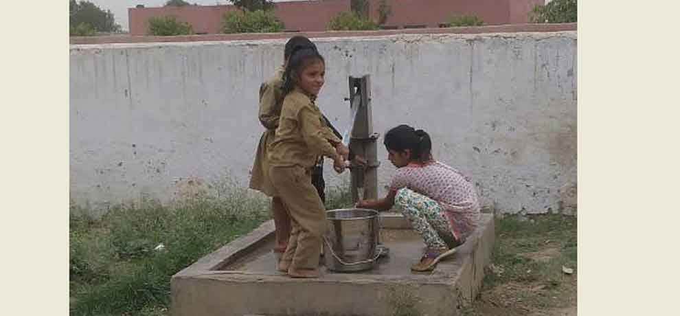 School in greater noida student has to clean utensil after having mid day meal