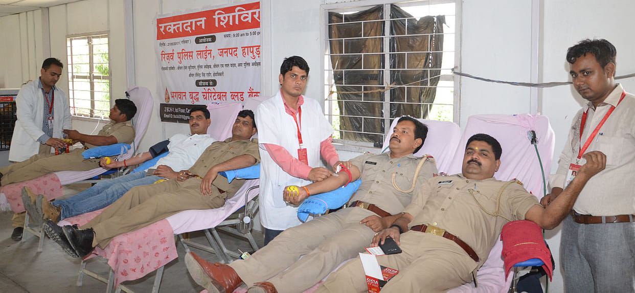Policemen raising blood donation