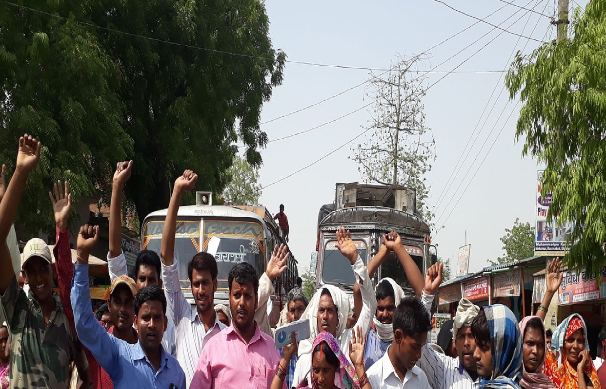angry customers do protest at road after miss behave of bank manager