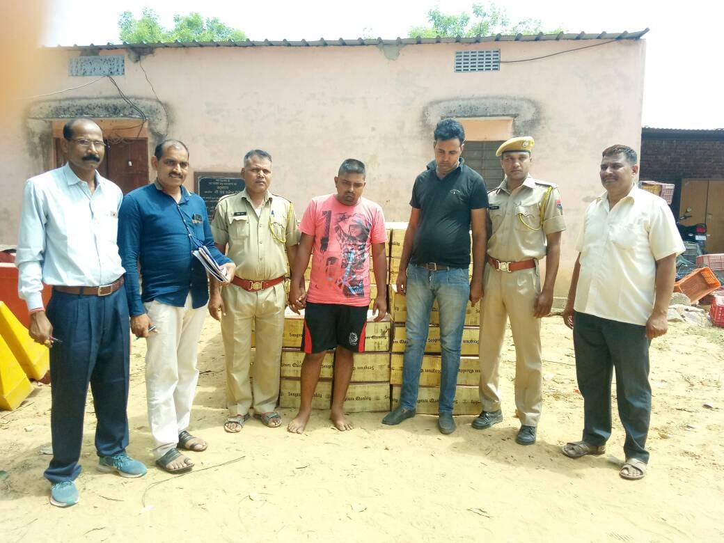 Smuggled under the iron tin shield, caught illigal liquor of 11 lakhs