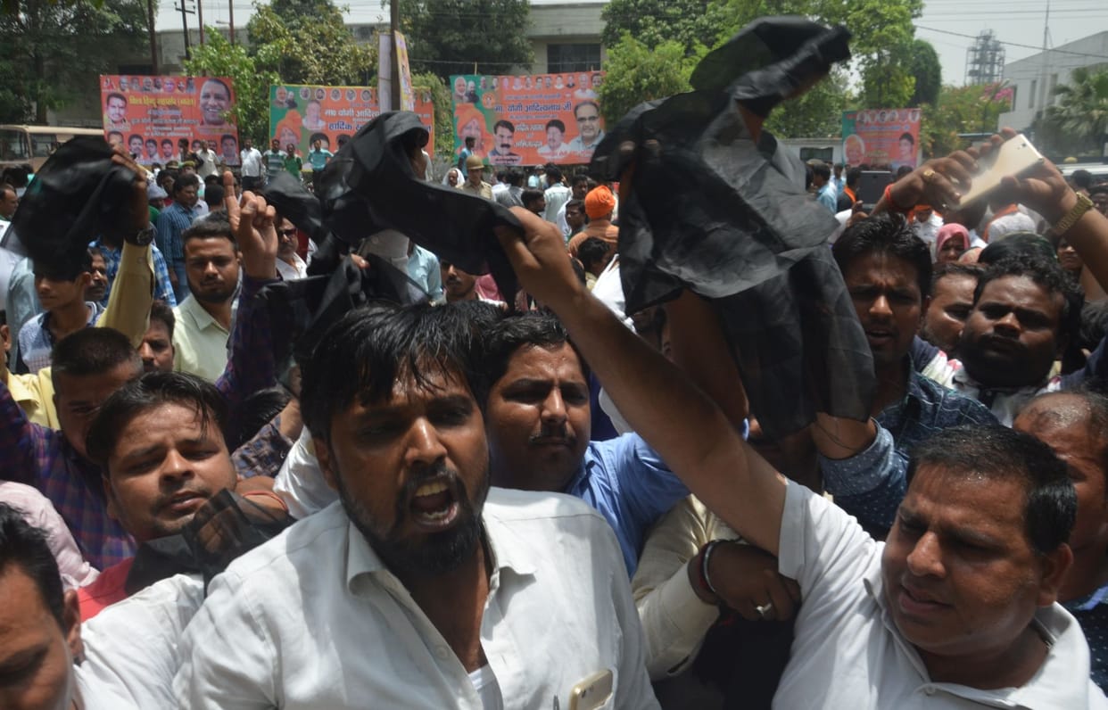 yogi inside and protest against yogi outside curcit house