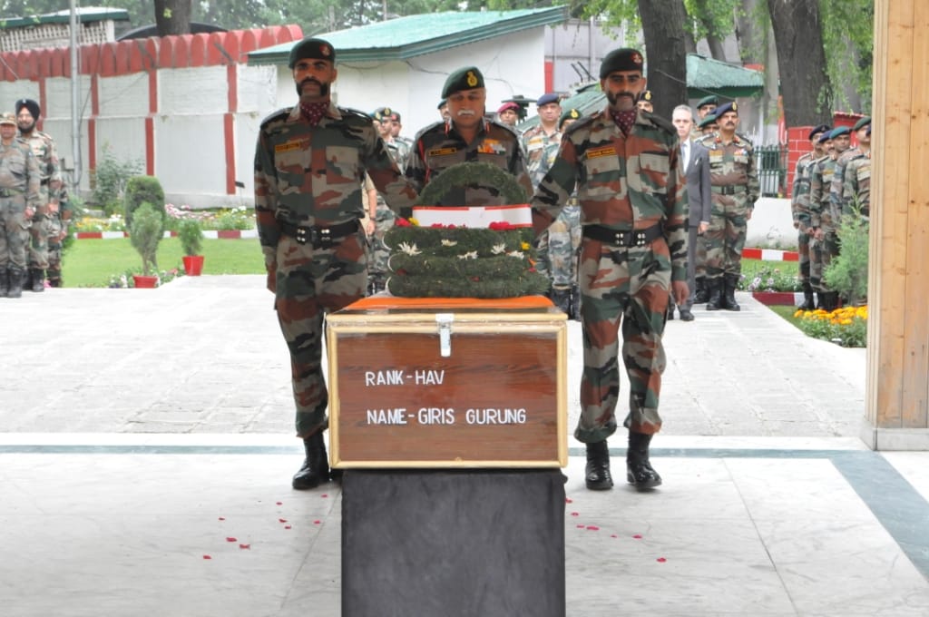 army paid tributes to martyrs of naugam