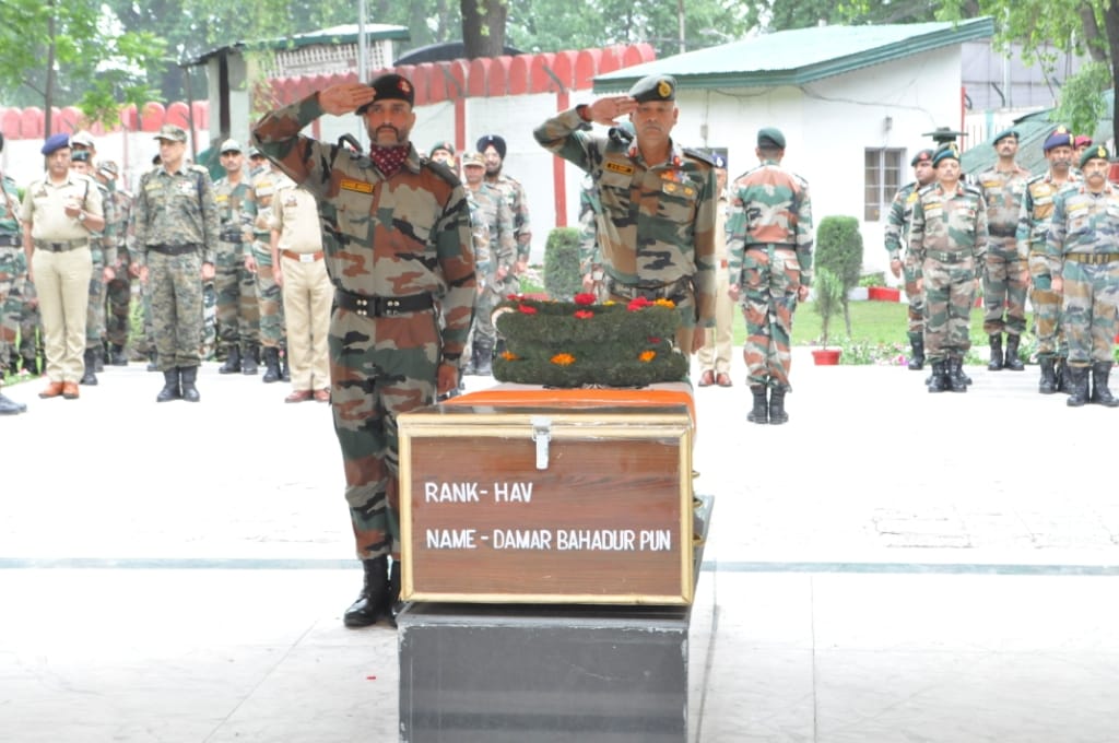 army paid tributes to martyrs of naugam
