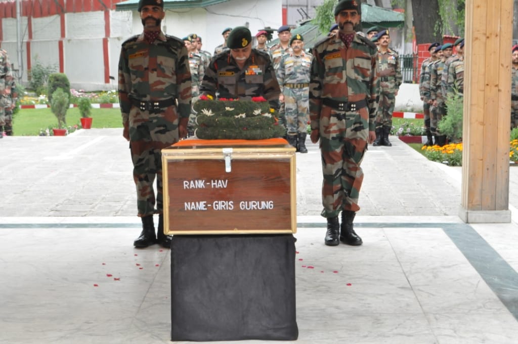 army paid tributes to martyrs of naugam