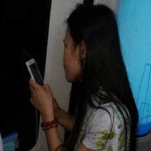 Woman Stands With Hair Stuck In Train's Doors