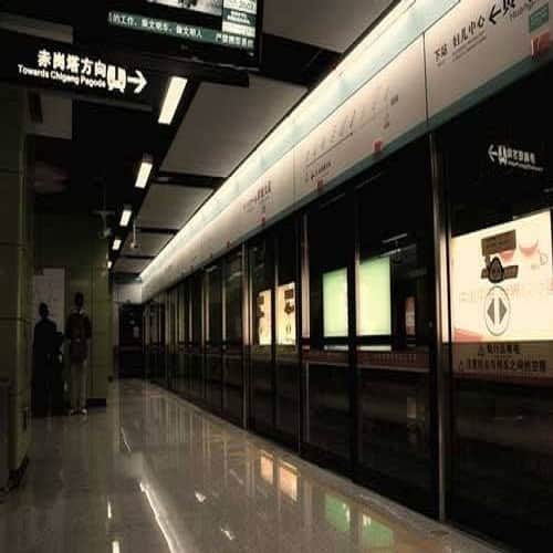 Woman Stands With Hair Stuck In Train's Doors
