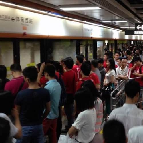 Woman Stands With Hair Stuck In Train's Doors