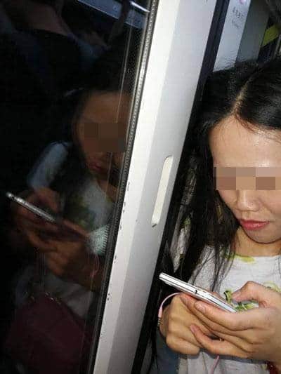 Woman Stands With Hair Stuck In Train's Doors