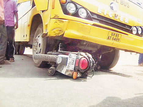 school bus rammed a bussiness men 
