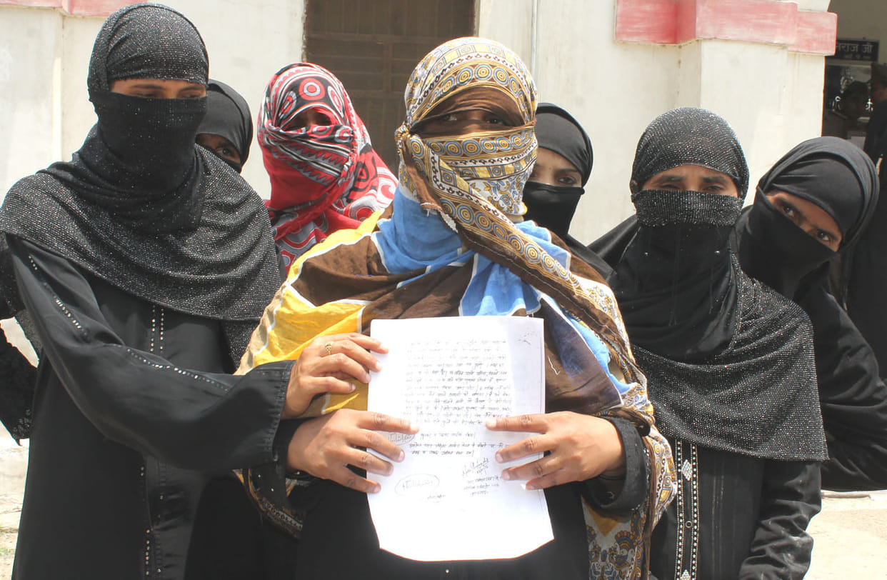 The women police cover their faces by hiding the identity of the rape victim