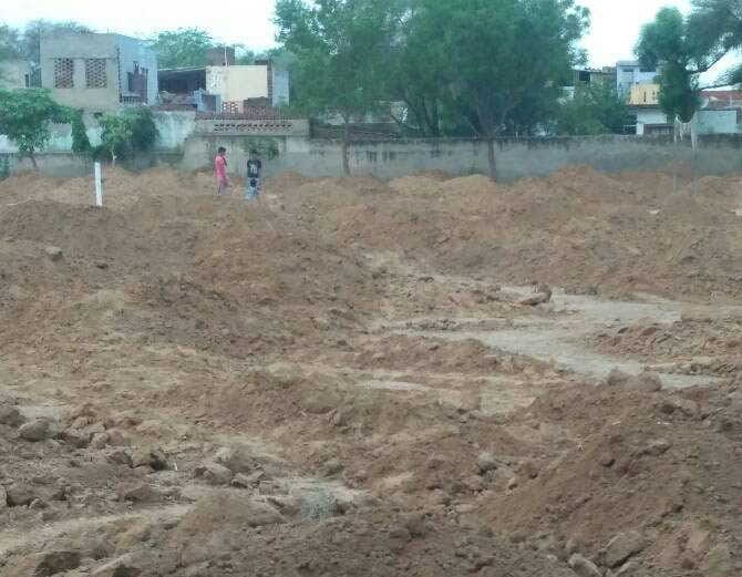 pitcher full of antique coins of silver coins found in excavations of farm at rewari