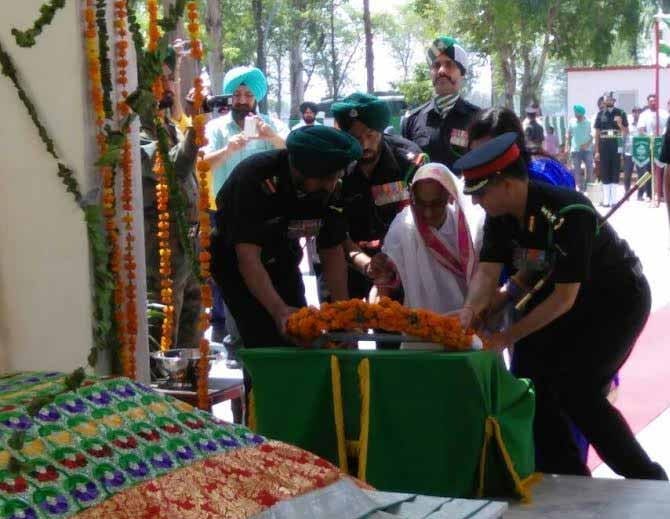 93 years old bibi rasoolan reached on wheelchair at veer abdul hameed majar in amritsar