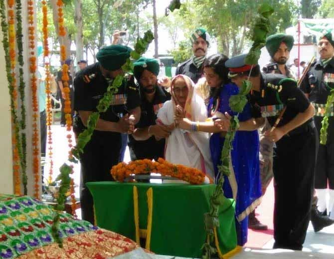 93 years old bibi rasoolan reached on wheelchair at veer abdul hameed majar in amritsar