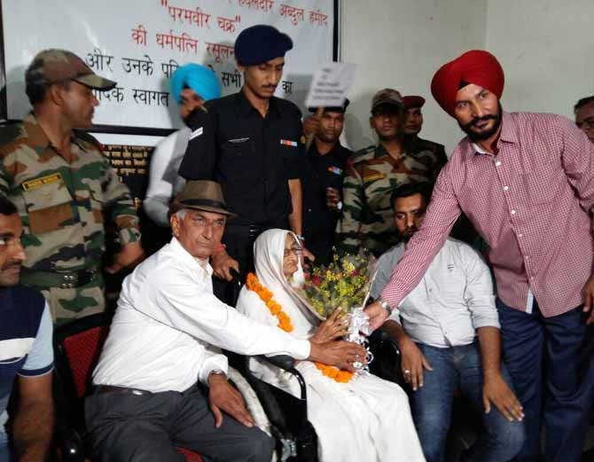93 years old bibi rasoolan reached on wheelchair at veer abdul hameed majar in amritsar