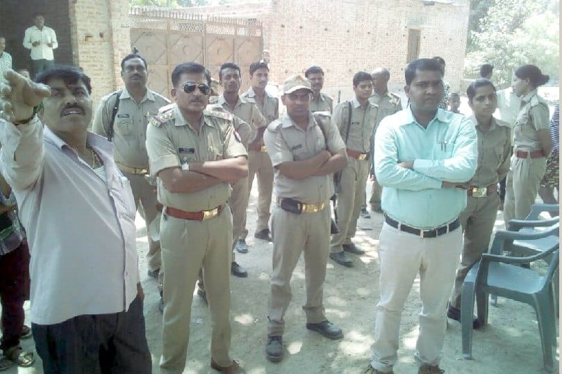 Vatsavitri worship in police protection in village Kheswahi