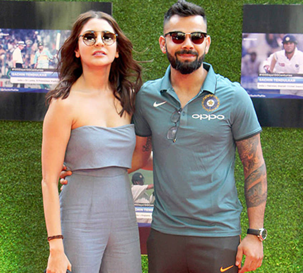 anushka sharma and virat kohli fashion style in parities see pics