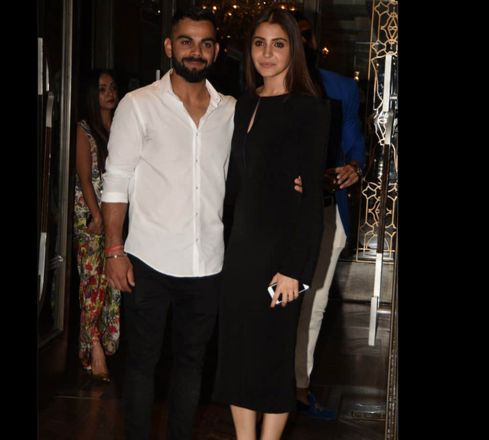 anushka sharma and virat kohli fashion style in parities see pics