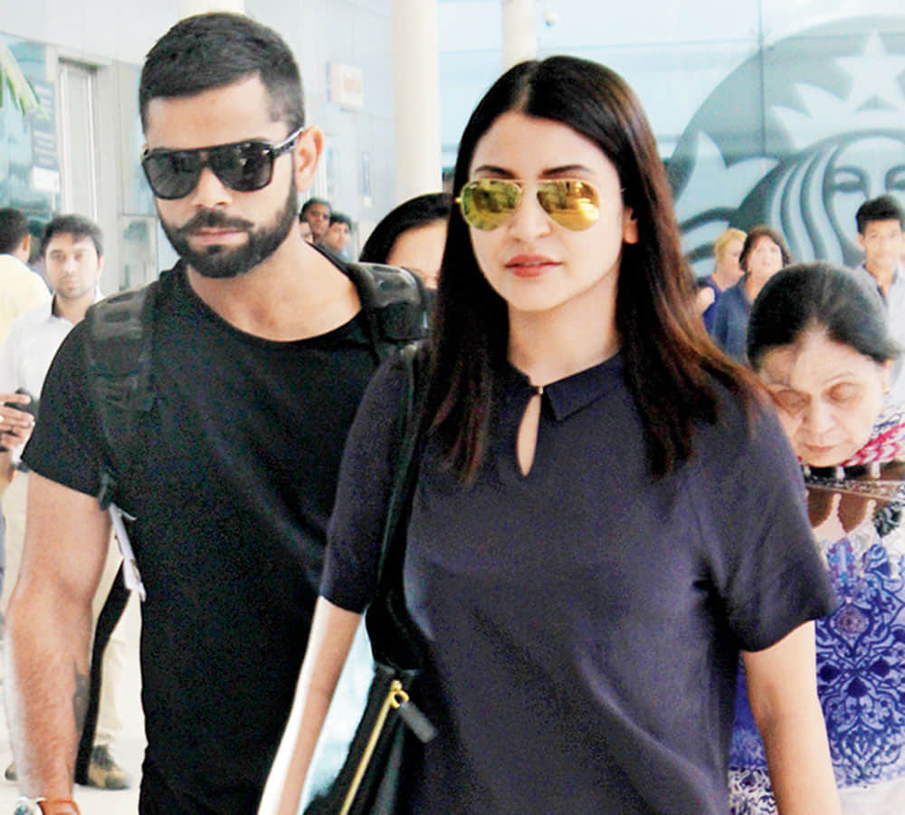 anushka sharma and virat kohli fashion style in parities see pics