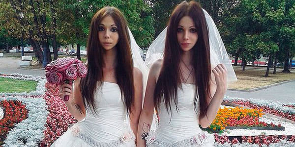 Identical female husband and wife