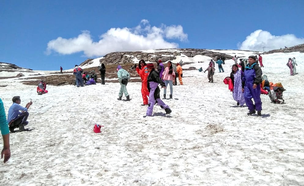 Snowfall at Rohtang, hailstorm in Himachal.