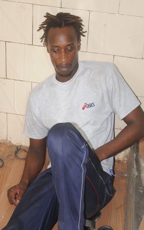 tanzania guy throw stone in church of agra