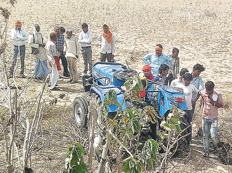 Driver's death by drowning under the tractor