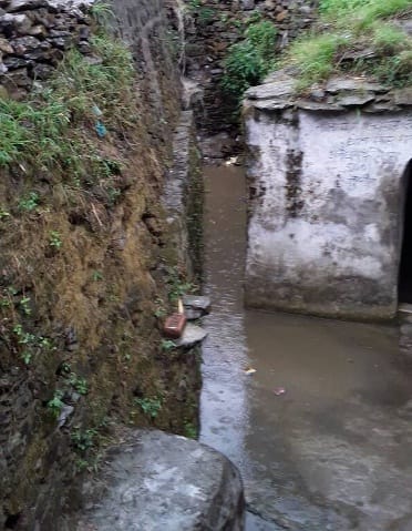 The dirt of the road drains into the navy