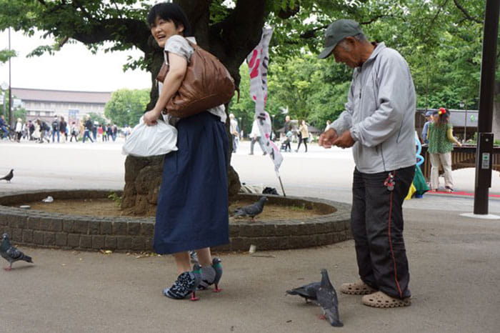 Japanese Woman Walking In Pigeon Shoes