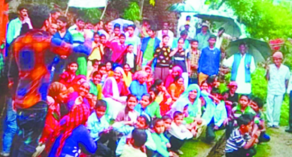 Sitting on the road for the entire village
