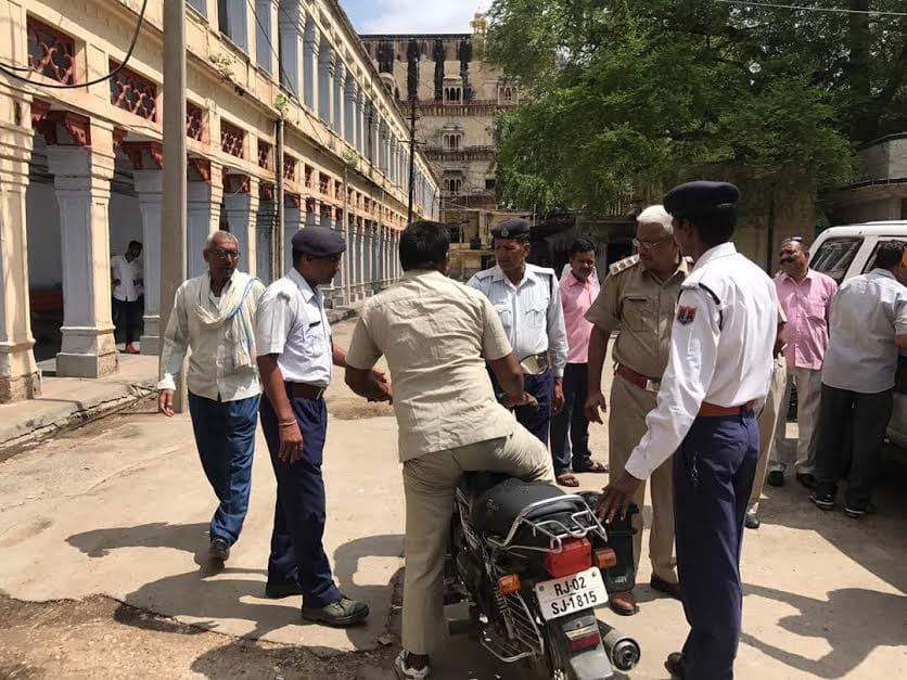 Police officers break traffic rules